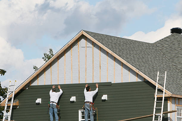 Professional Siding technician working in Ruther Glen, VA